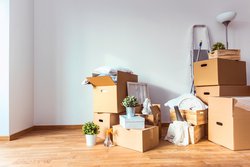 Cardboard boxes and cleaning things for moving into a new home at Mills Crossing apartments located in Lagrange on Mitchell Ave